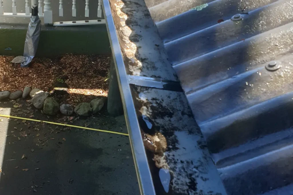 Gutters after the debris has been removed to be disposed of by Waterboy Washing