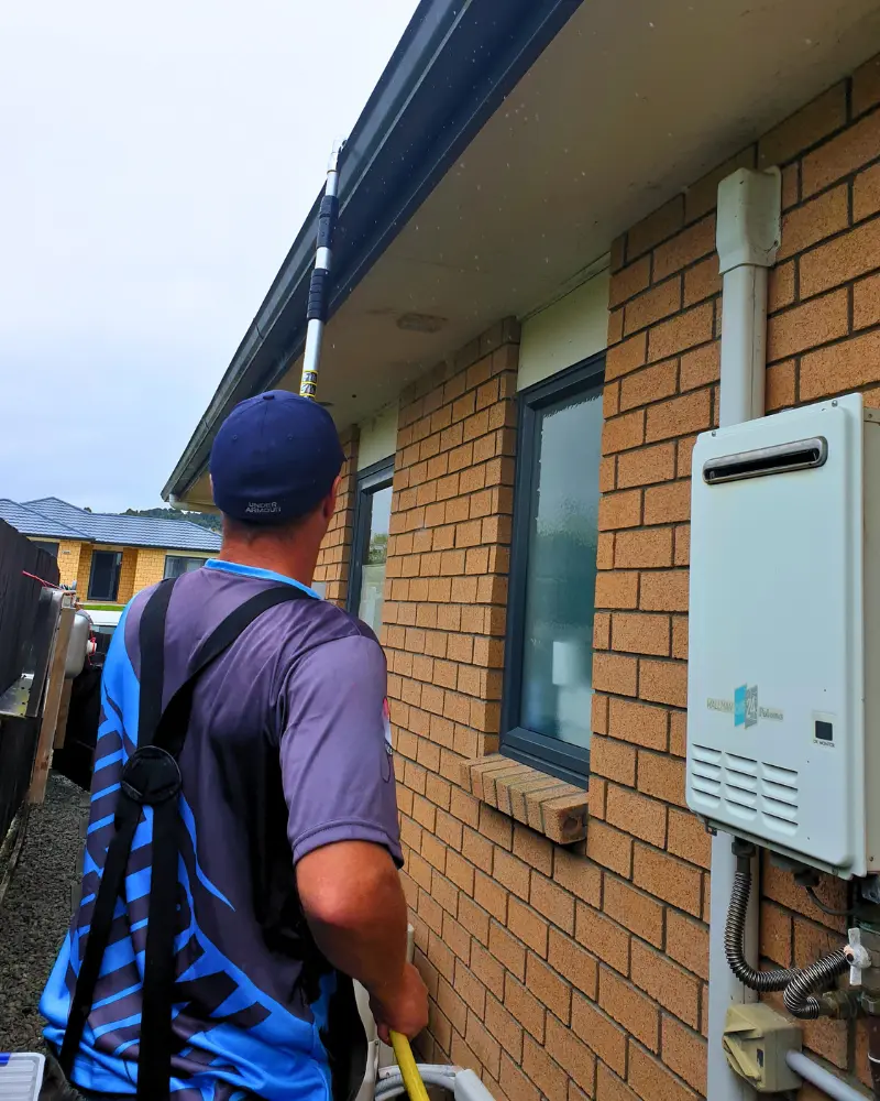Waterboy Washing using soft washing to clean gutters in Hamilton